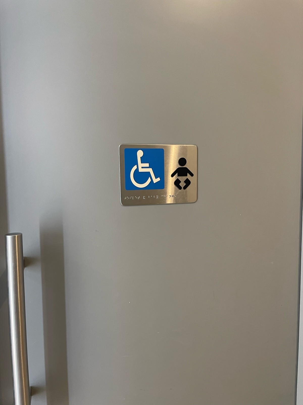 Sign to toilet door is wide opens inward not locked