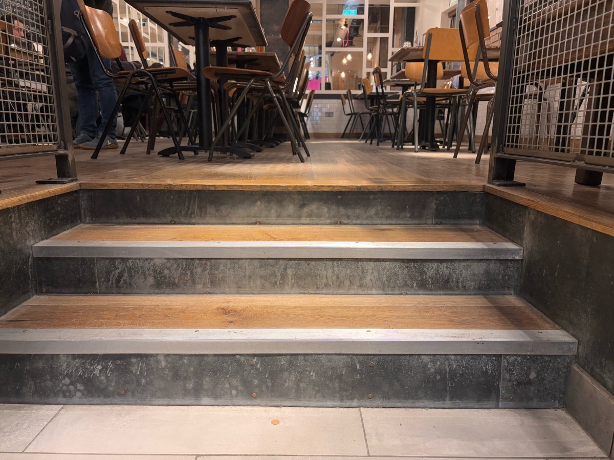 Close up of three steps going up.