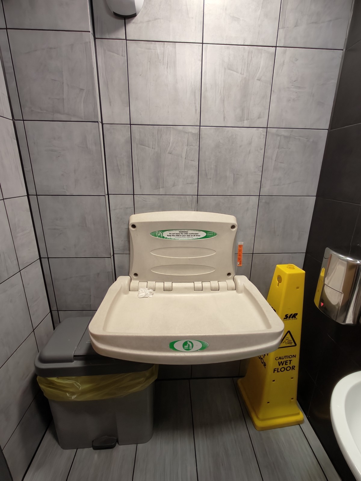 From sink facing left. Baby change table at back.