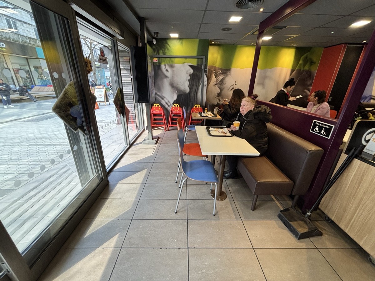 From entrance facing left. Half booths along right.