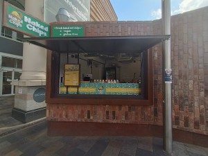 From street, facing venue. Counter along back.