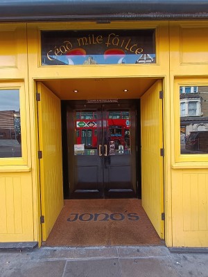 Yellow wooden doors. Push from middle to open.