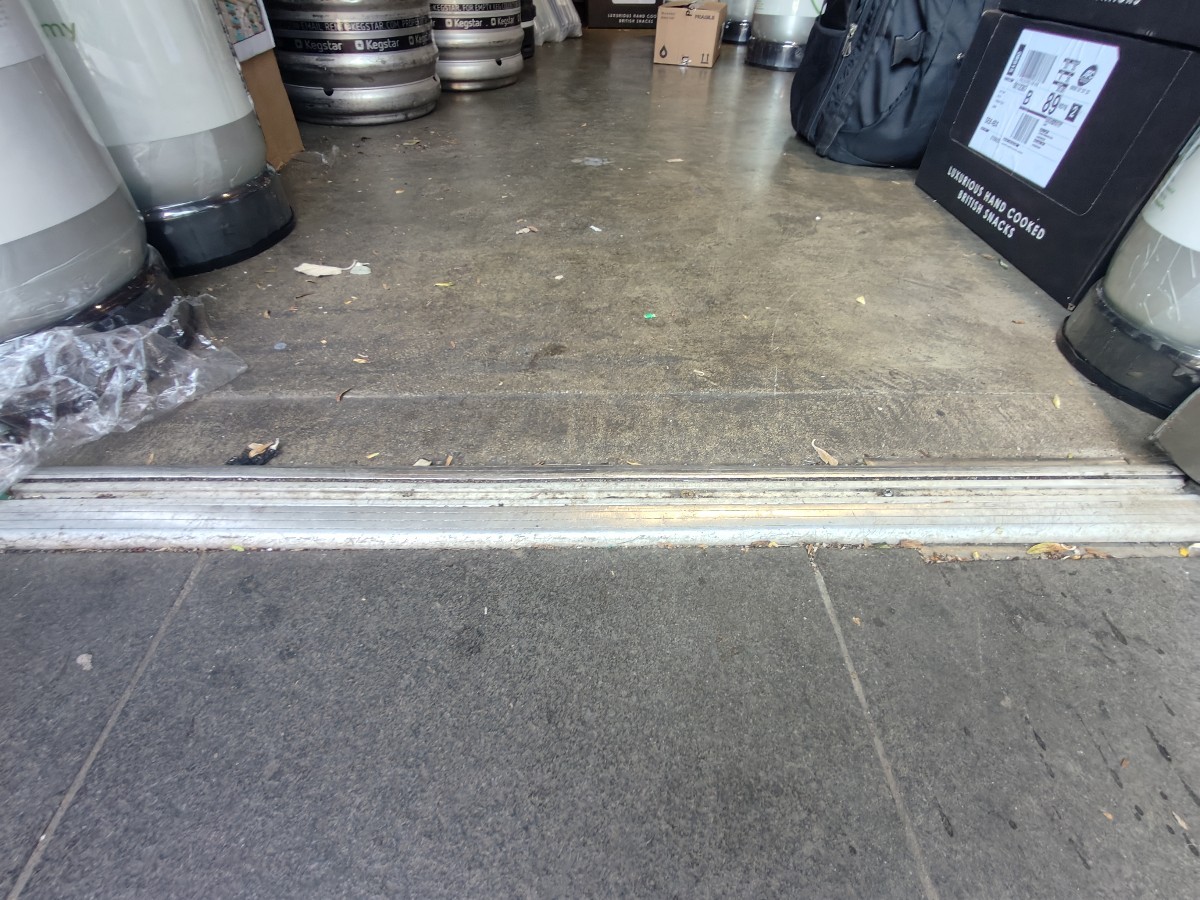 Small bump on threshold of door.