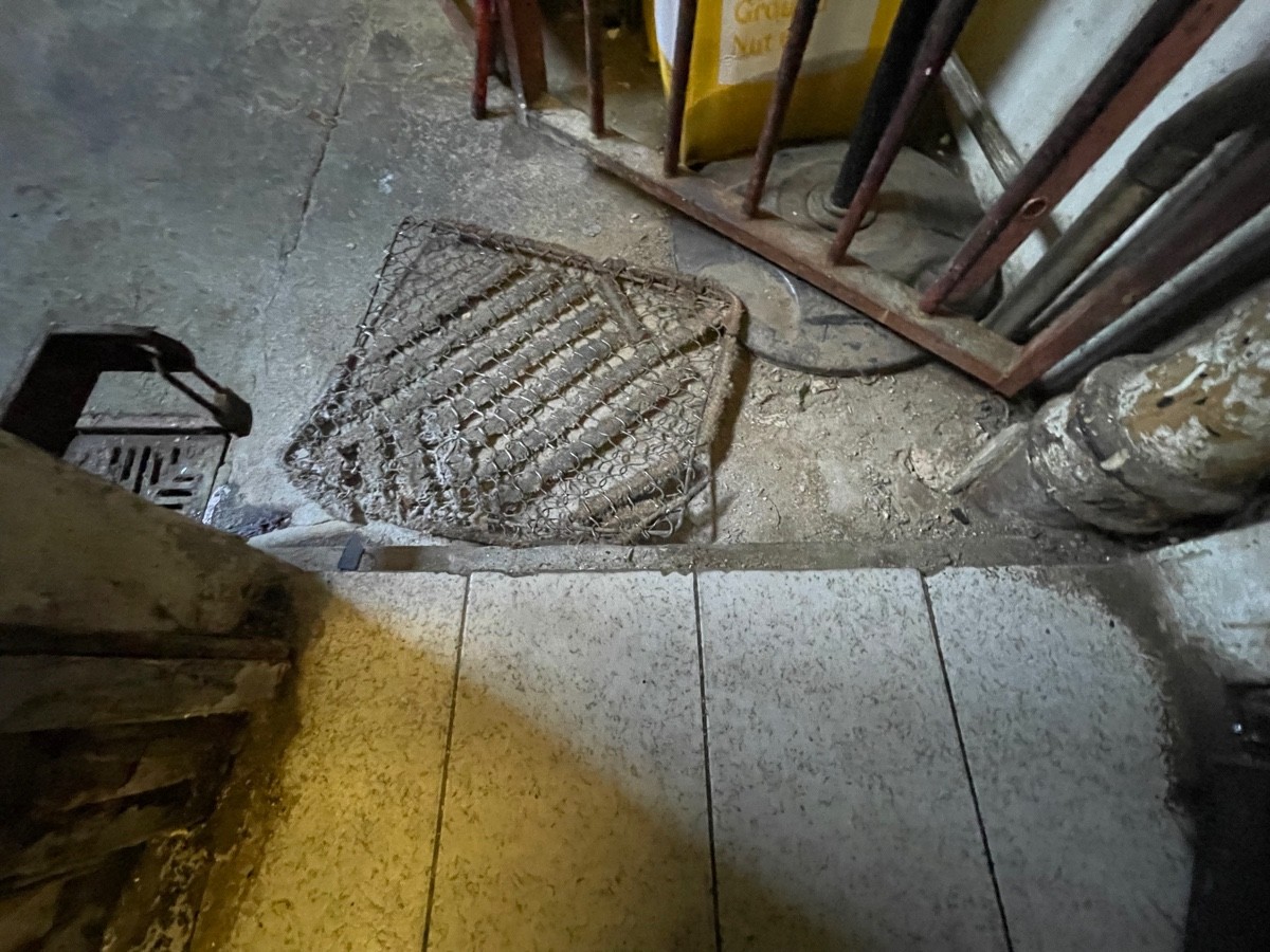 Small bump down at foot of doorway.