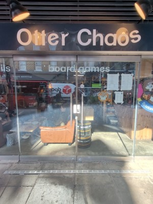 Glass doors. Pull silver handles in centre to open.