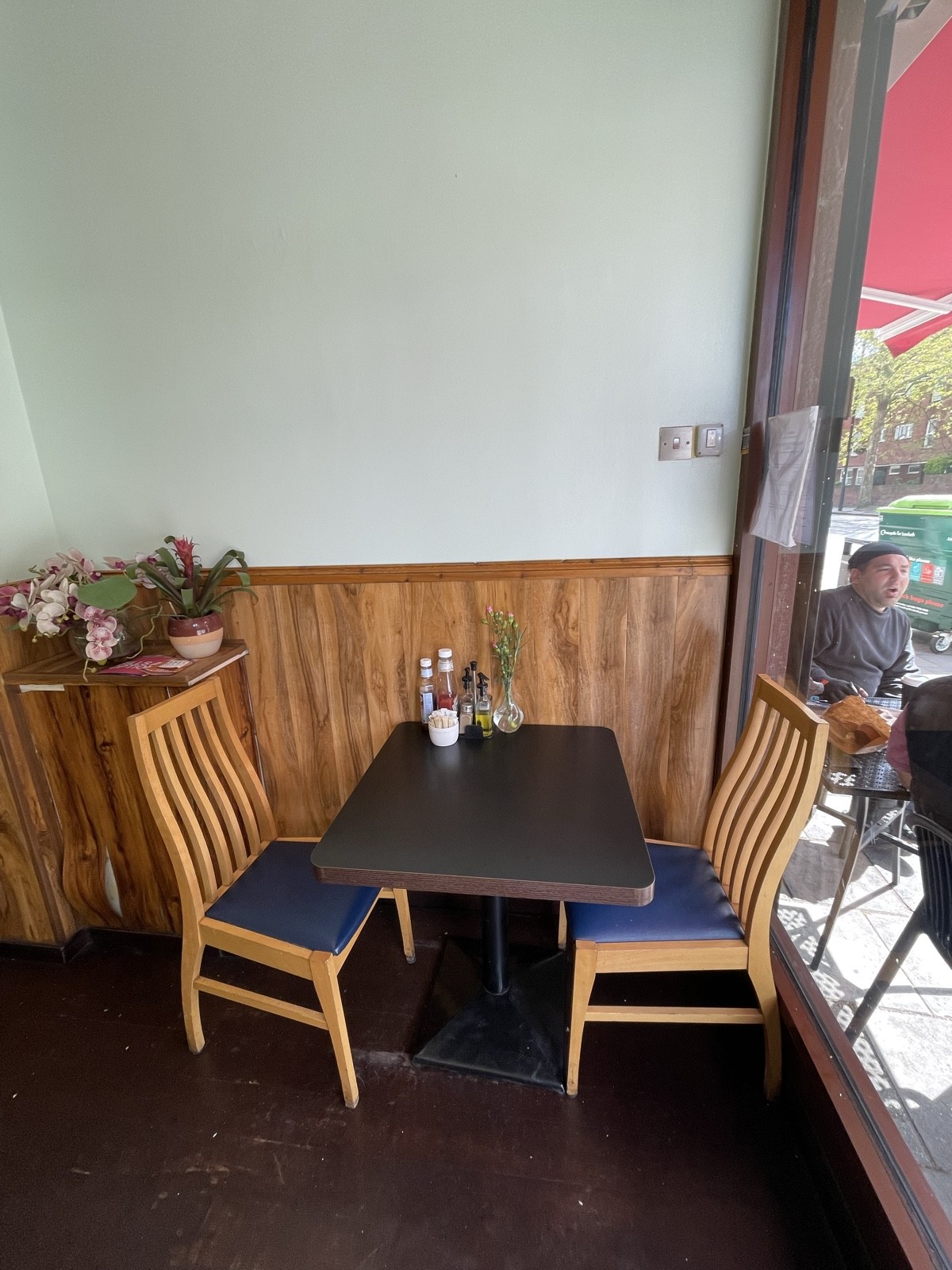 From entrance facing right. Table and chairs ahead.