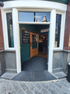 Preceding green framed doors. Push golden handles in centre to open.