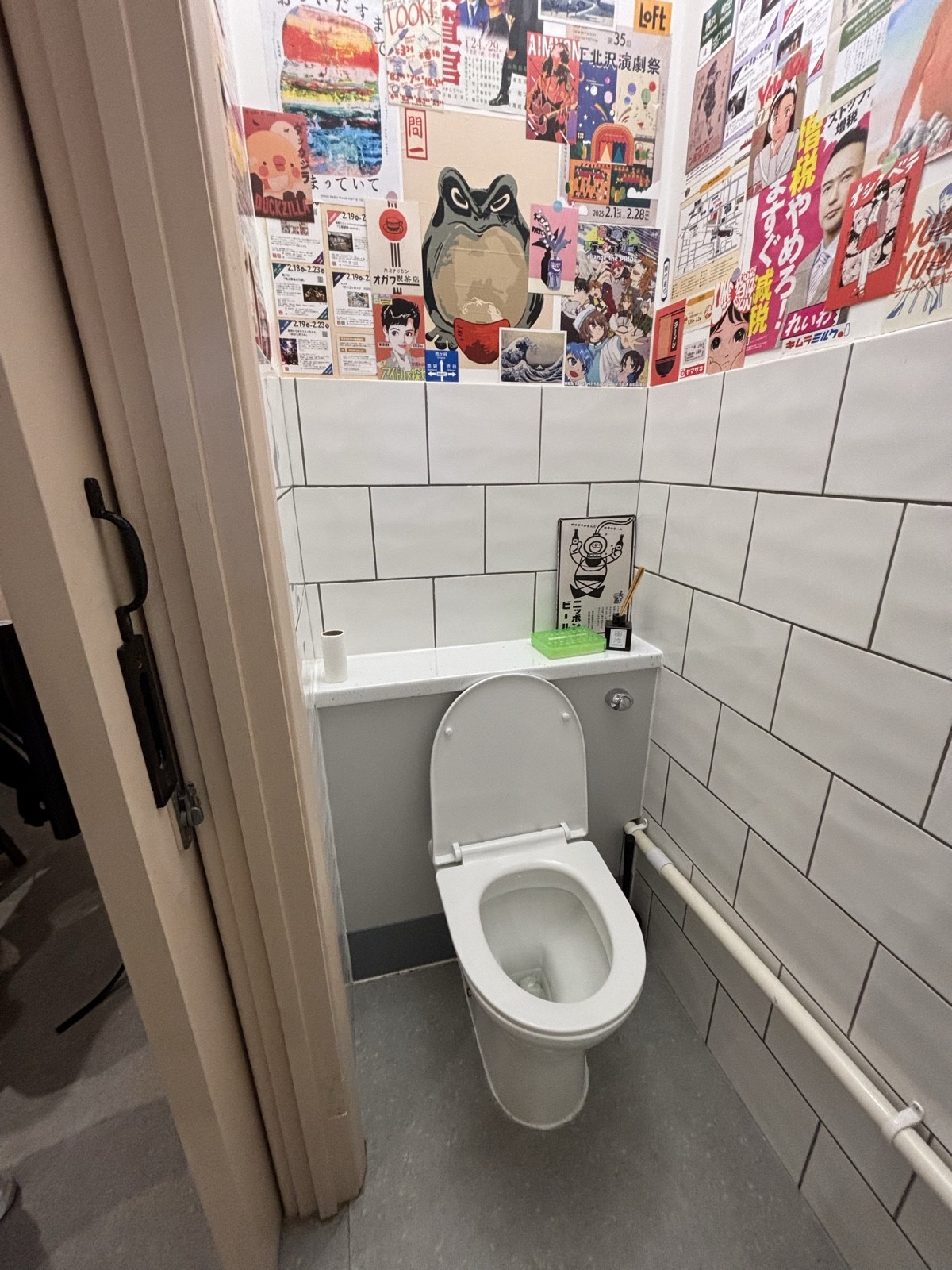 From door facing left.Toilet ahead.