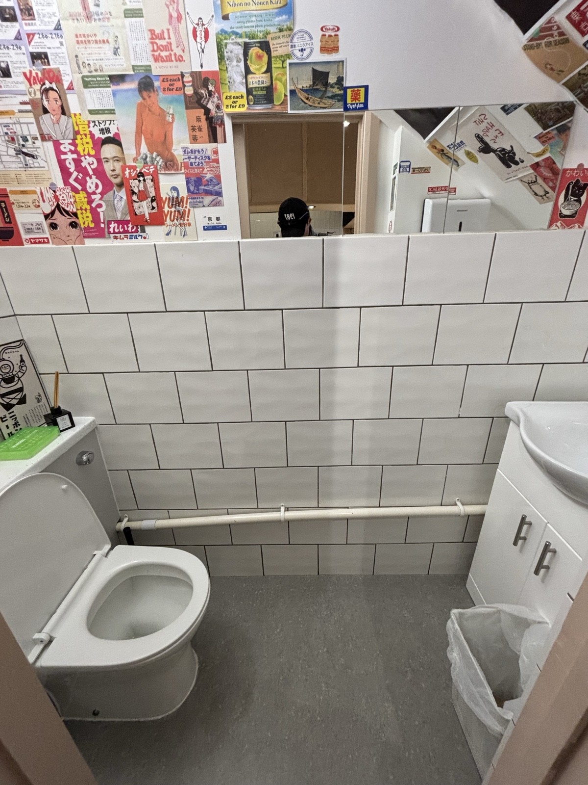 Front door facing street. Toilet on left. Sink on right.