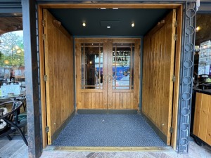 Preceding wooden doors ahead. Push in the middle to open.