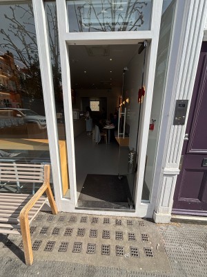 Glass door ahead. Push from left to open.