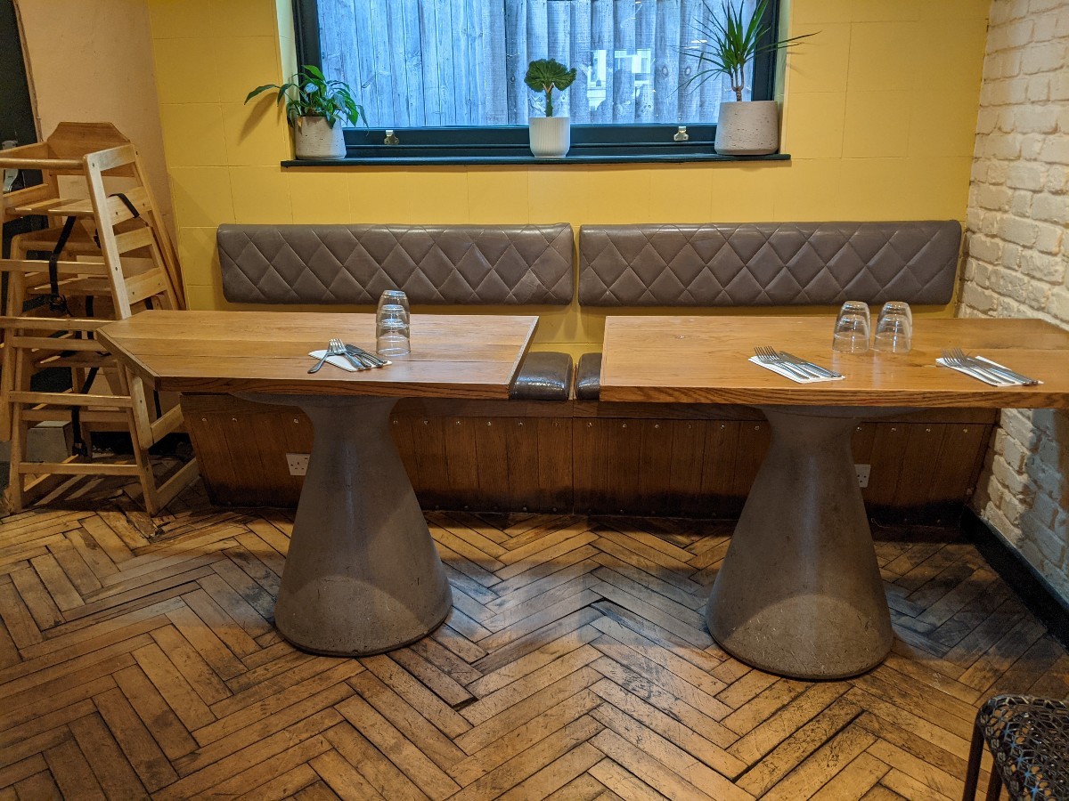 From after tables facing straight. Half booths ahead.