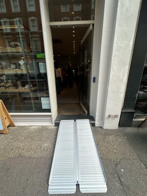 Glass door. Push from left to open.