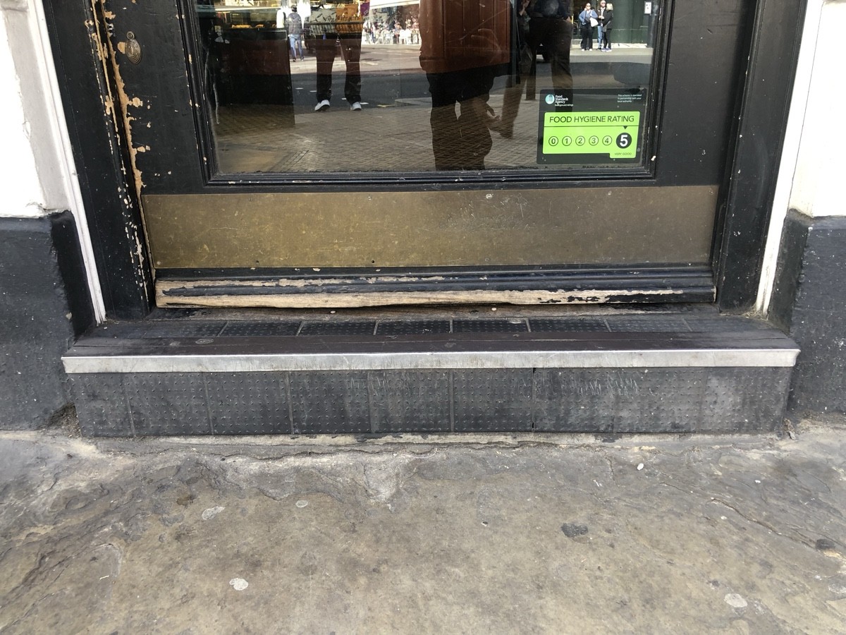 Step up before entrance.
