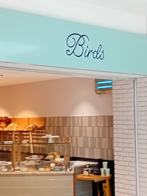 Enterance to Birds shop it has open door and flat flooring.

Quiet and dog friendly it also has a toilet at back of shop too.