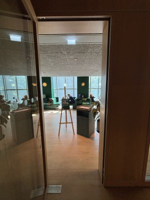 Glass door ahead. Pull from right to open.