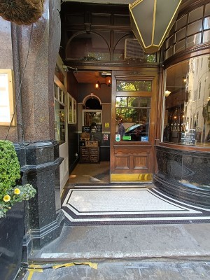 From street facing venue, step up to doorway at back.