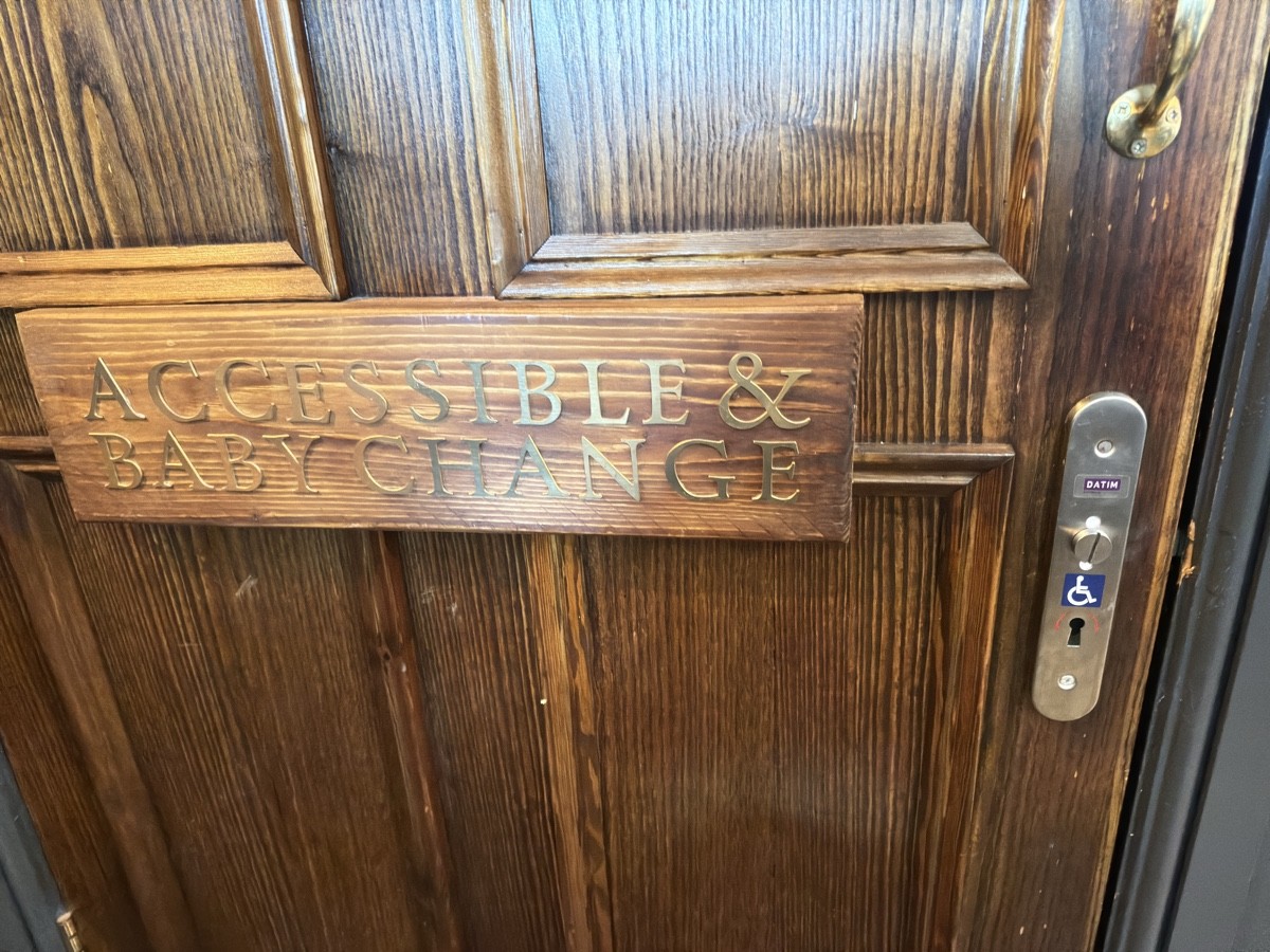 Toilet doubles as baby change facility