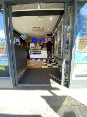Glass doors with grey frames ahead