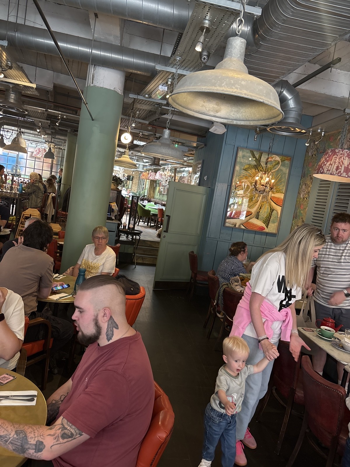the tables in the restaurant are close together, but there is room for a wheelchair user to navigate down the right hand side of the restaurant