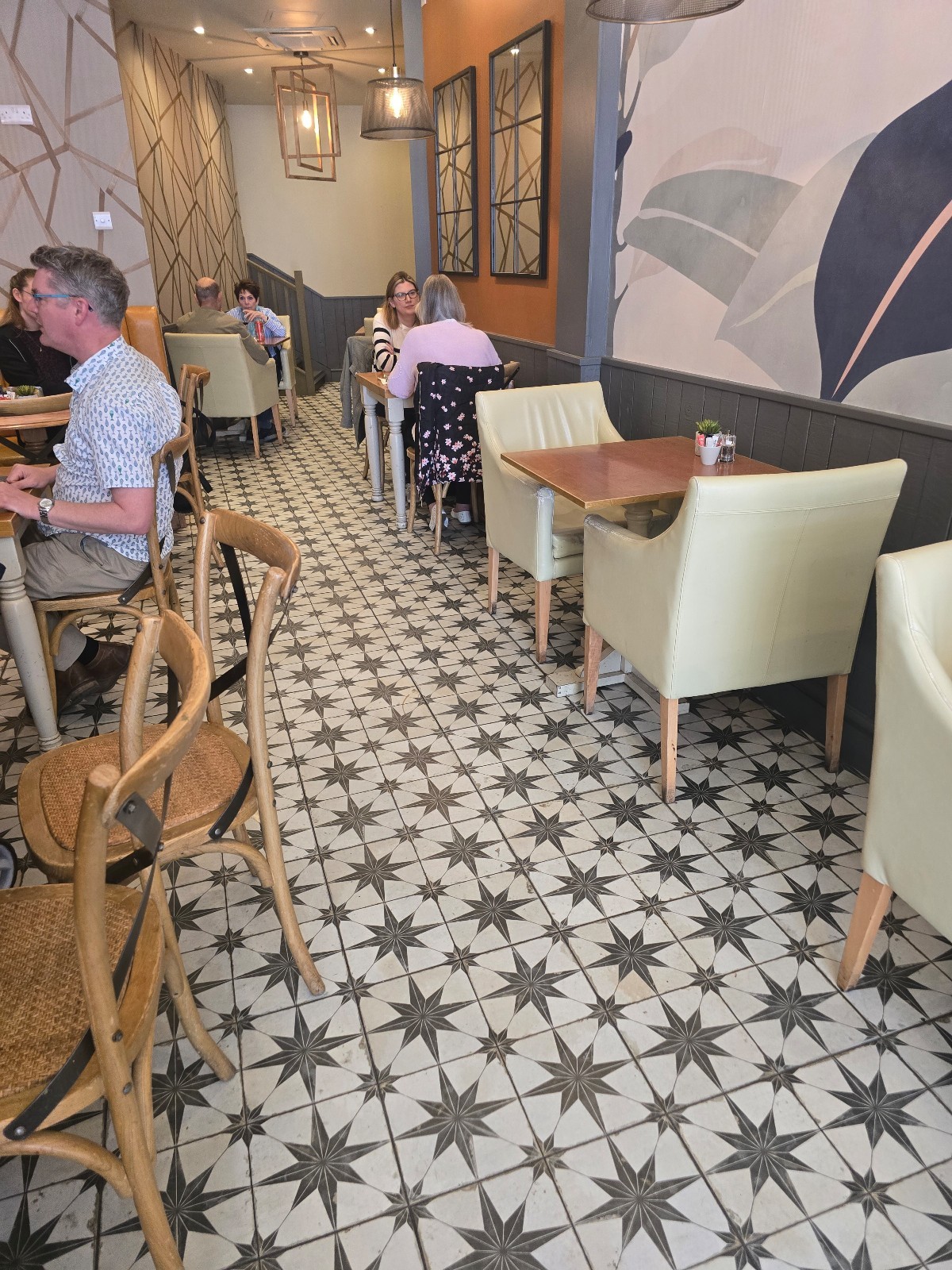 Tables and chairs inside Lucky Days