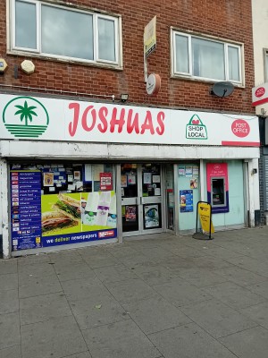 Now changed its name from Mccolls to Joshuas.

Double manual door to get into the shop which is made of glass.