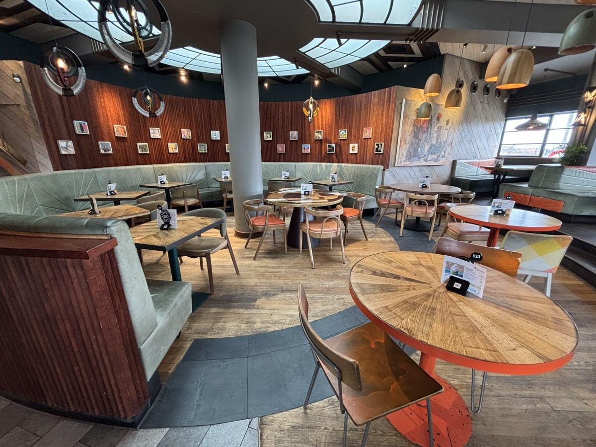 From end of divider facing left. Tables on right. Divider on left.