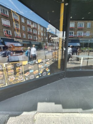 From left of venue facing straight. Path ahead going right to built-in ramp to door.