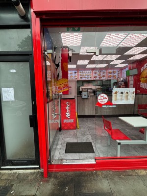 Glass door ahead. Push from right handle to open.