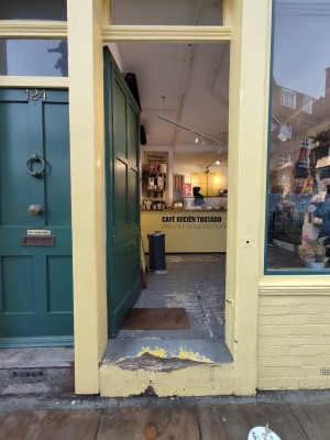 Green door. Push from right to open.