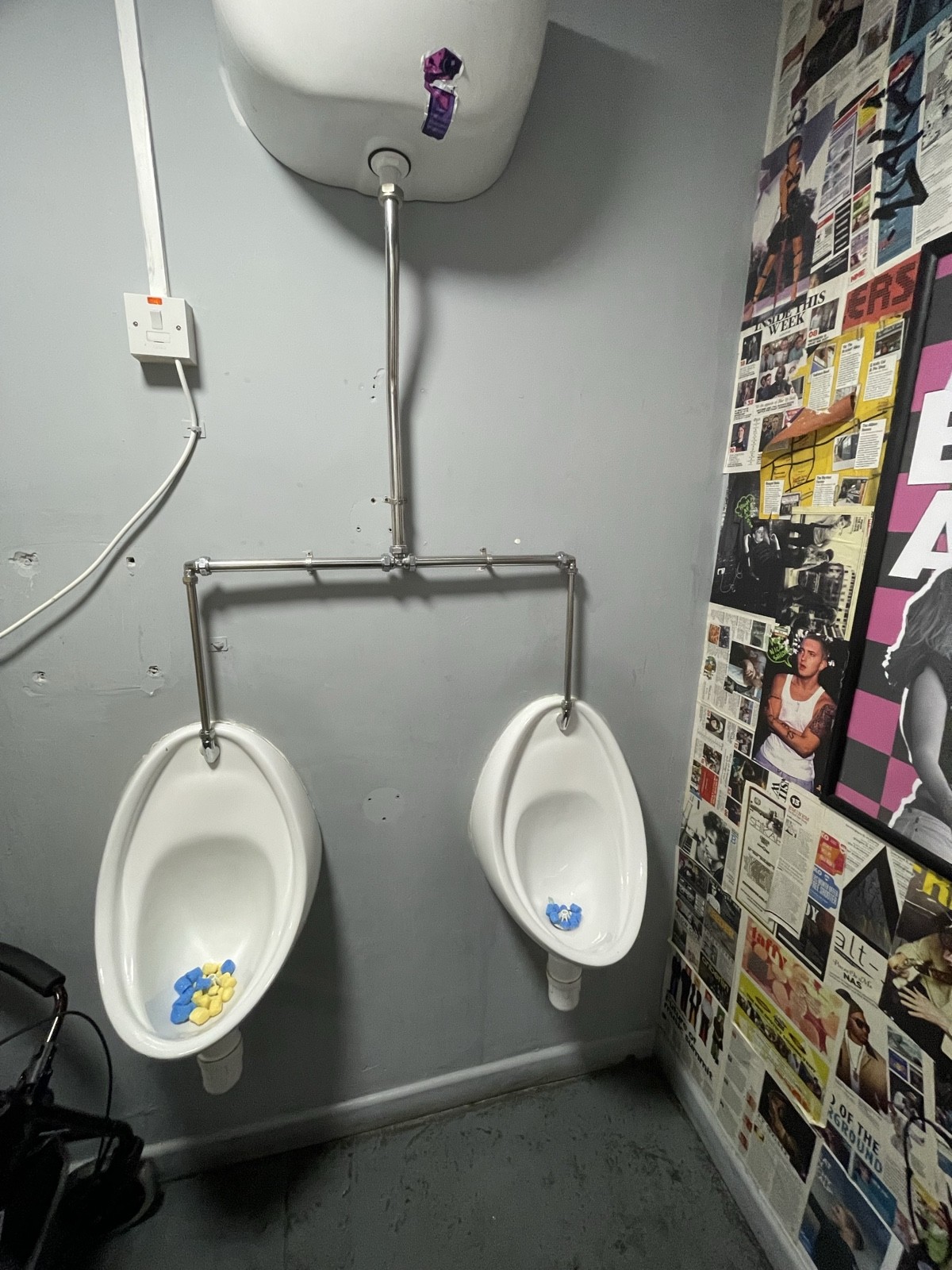 Two urinal also located in this toilet.
