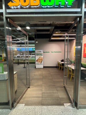 Glass doors. Push from centre to open.