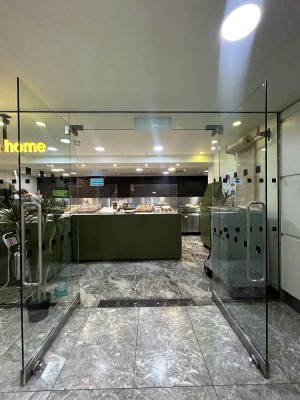 Glass doors ahead. Pull silver handles in centre to open.