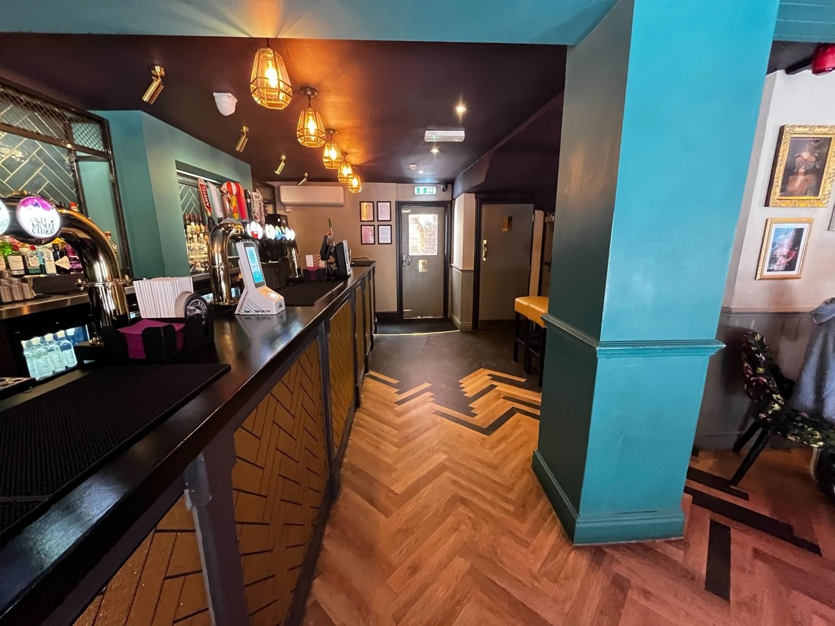 From start of bar facing right. Column to right.