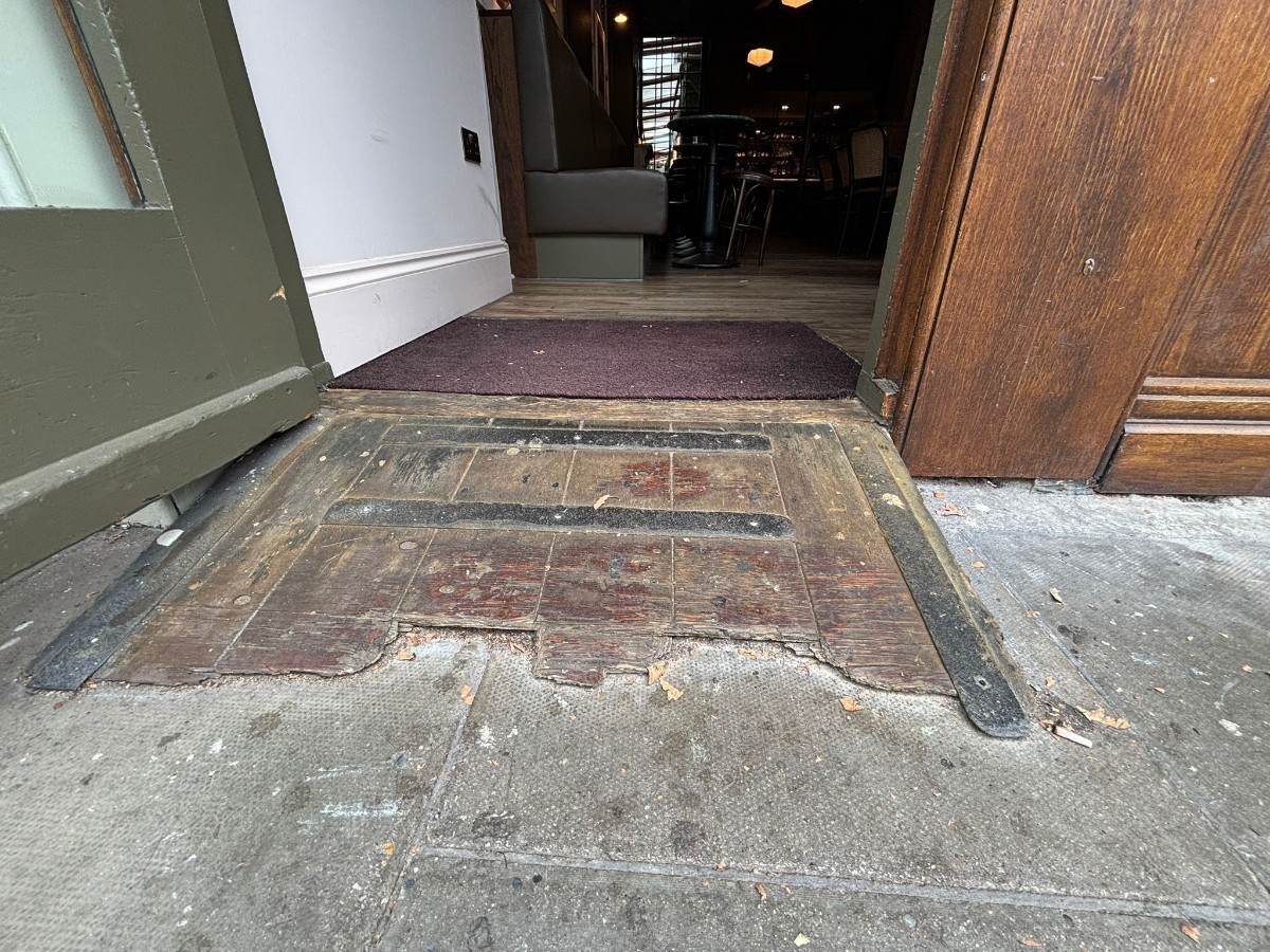 Ramp up before doorway, doormat after.