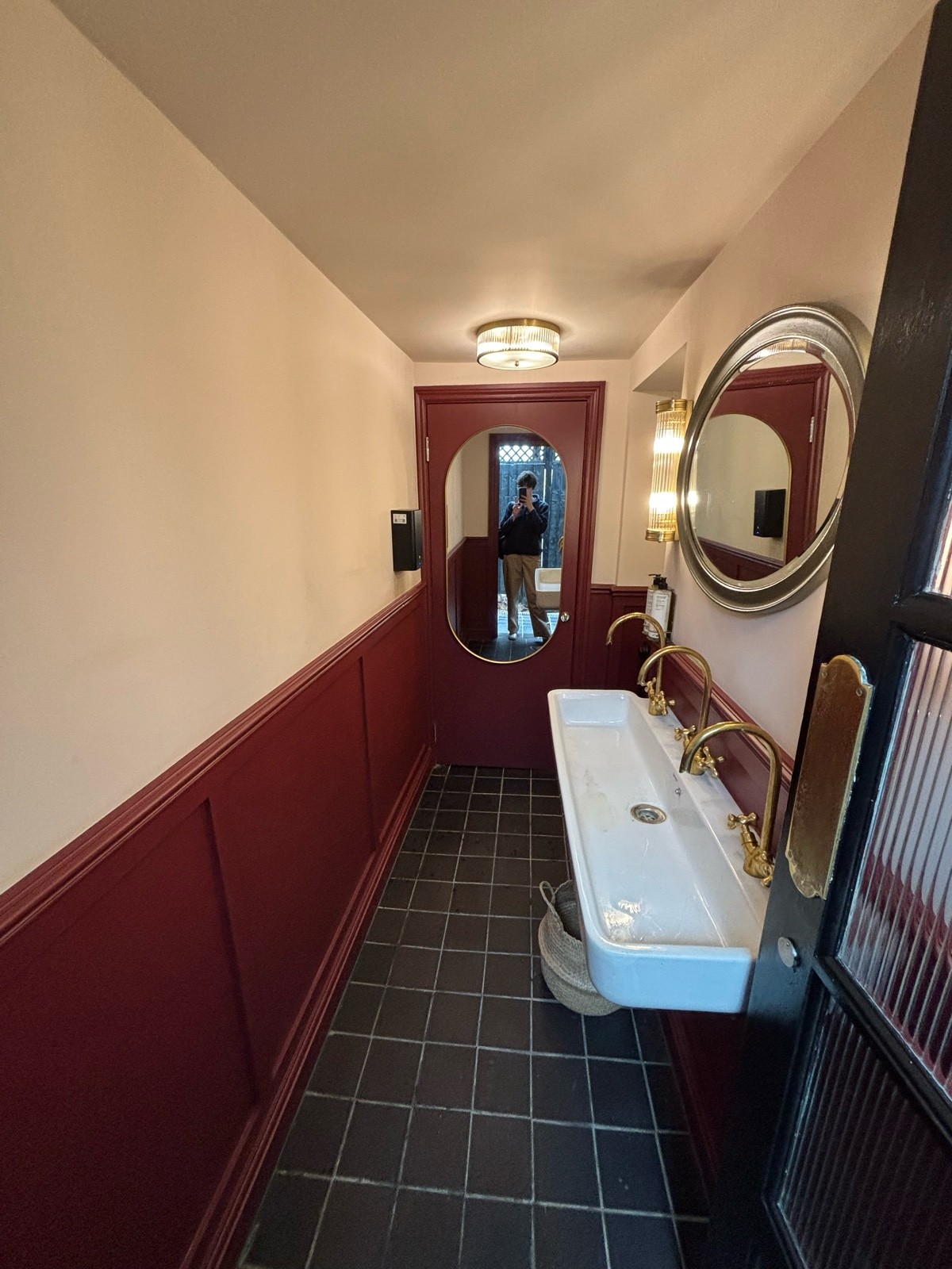 From preceding bathroom door facing straight.
Sinks along right.