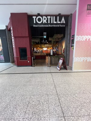 From outside facing main entrance. There main area right ahead.