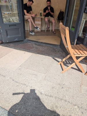 Photo of the entrance showing a small wooden raised bit