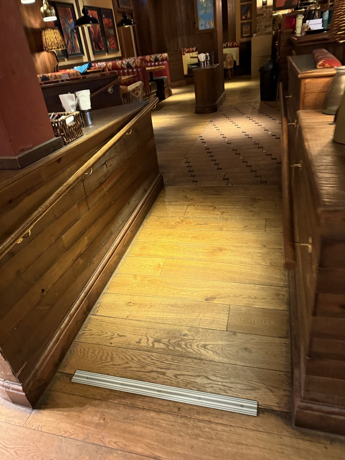 Ramp around the open plan seating to get to the toilets and more seating and access to the bar via this ramp.