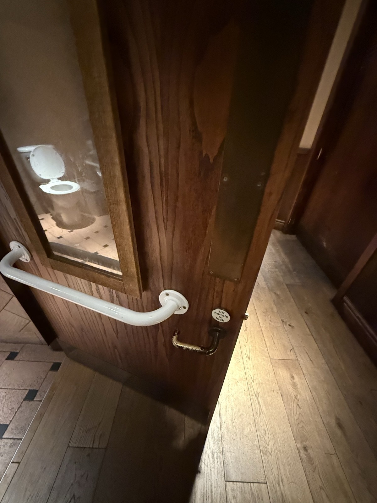Lift handle to lock and accompanied grab handle.