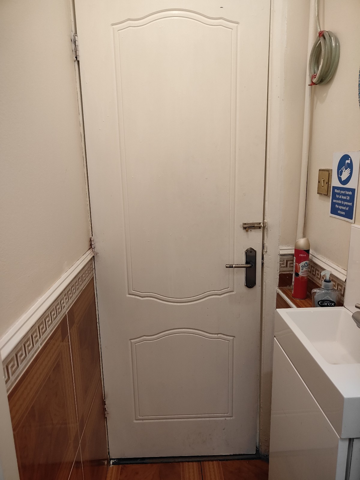 Back of door. Lock on right.