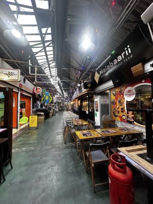 Facing from market entrance. Venue on the right.