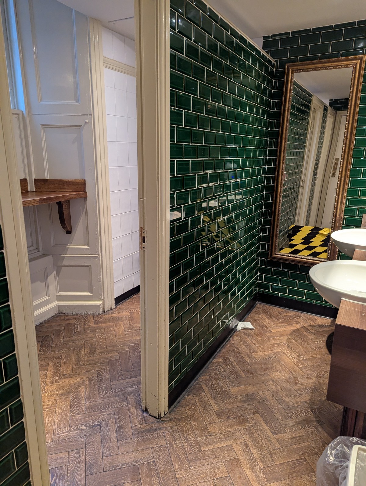 Main part of the ladies bathroom. Two toilets available, both quite spacious. Sinks are quite low.