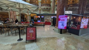 From street facing venue. Boards to both sides. Entrance in center