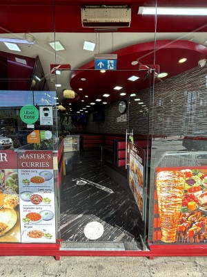 Glass door Agnes’s with silver handle. Push door inwards to open.