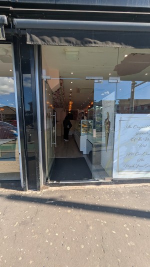 Glass door. Push metal handle on right to open