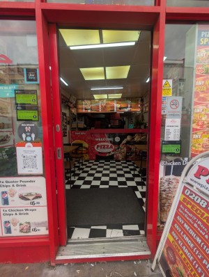 Red frame door. Slide from right to left to open.