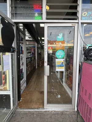 Double glass doors with metal frame, door handles at the centre, pull to open