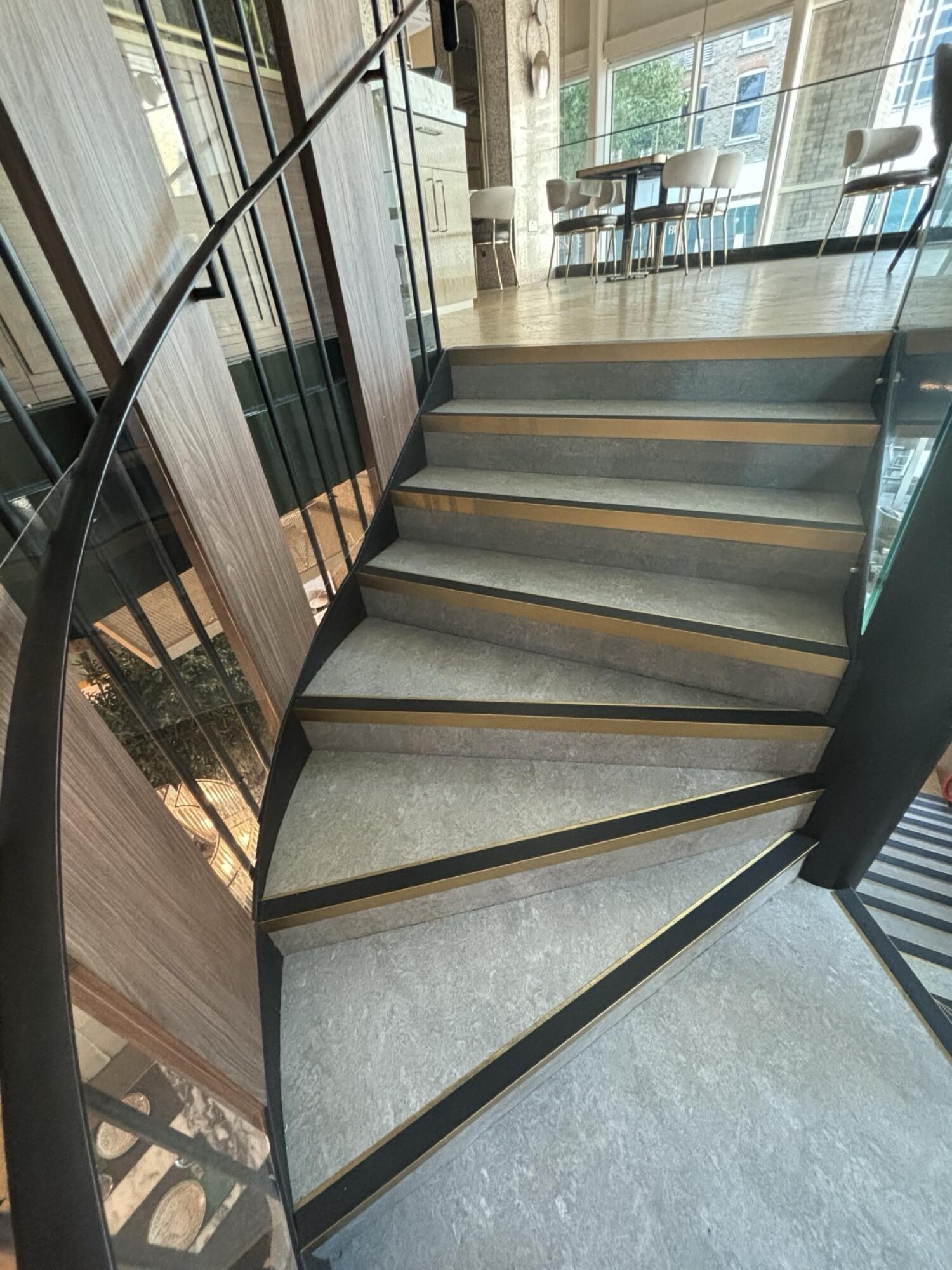 From curved steps facing right. Three steps curve to the right followed by stairs up.