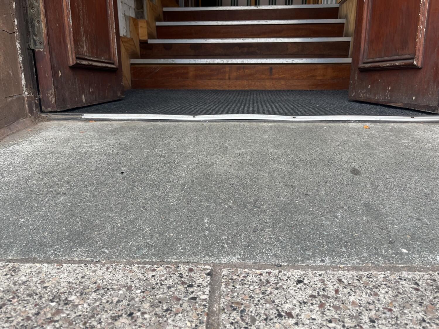 Ramp up at door.
